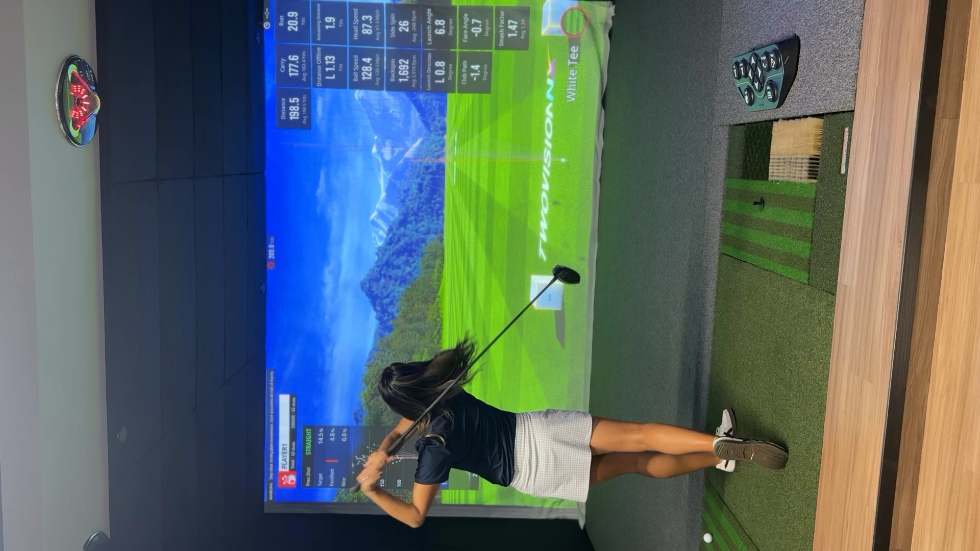 GOLFZON TwoVision NX screen displaying ball speed, launch and club data
