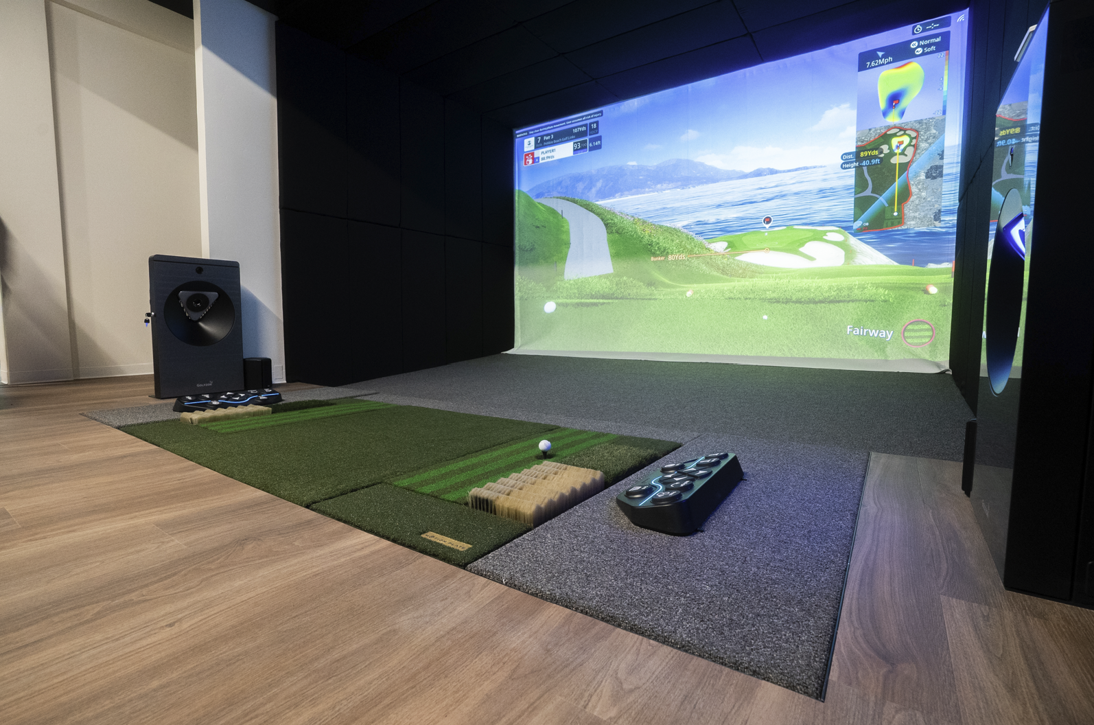 Interior of a Golf Envy club with GOLFZON simulator bay