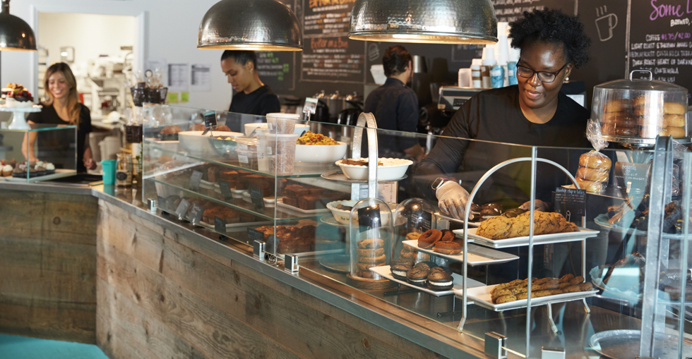 People working in a cafe