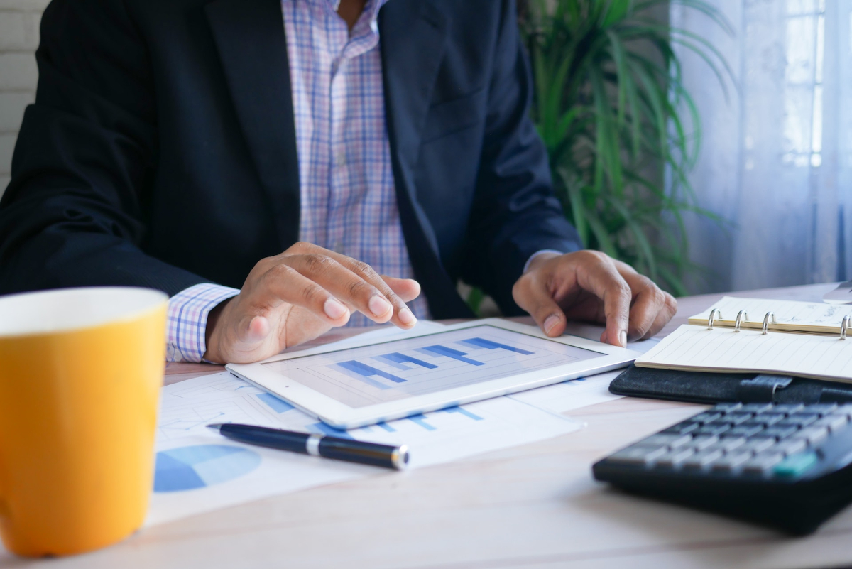 Business person looking at graphs