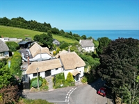 stunning coastal thatched village - 1