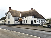 attractive character detached thatched - 1