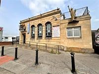 large building with development - 1