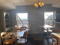 long-standing family-run café based - 2