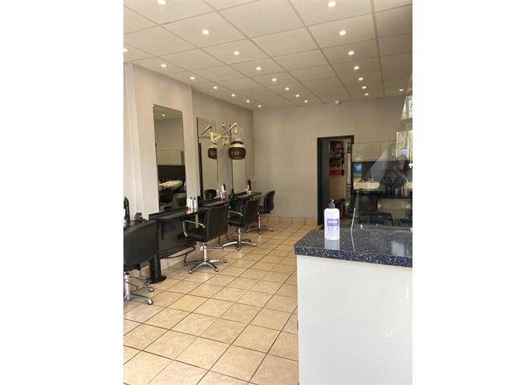 Buy a well established hair salon with 2 bedroom flat in woking