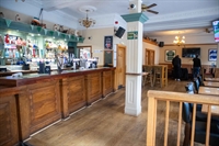 prominent pub by stadium - 3