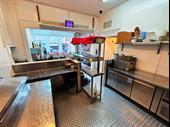 staff run pizzeria-takeaway with