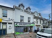 excellent mixed-use investment producing